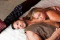 western, cowboy, Sexy sensual heterosexual couple, man, young caucasian woman in love on bed kissing, hugging. Beautiful passionate couple is having sex in a bedroom. Portrait of passion, pleasure, sex, relationship. Copulating